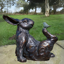 Playful Rabbit with a Bird on his Foot bronze effect figurine quirky garden or patio decoration