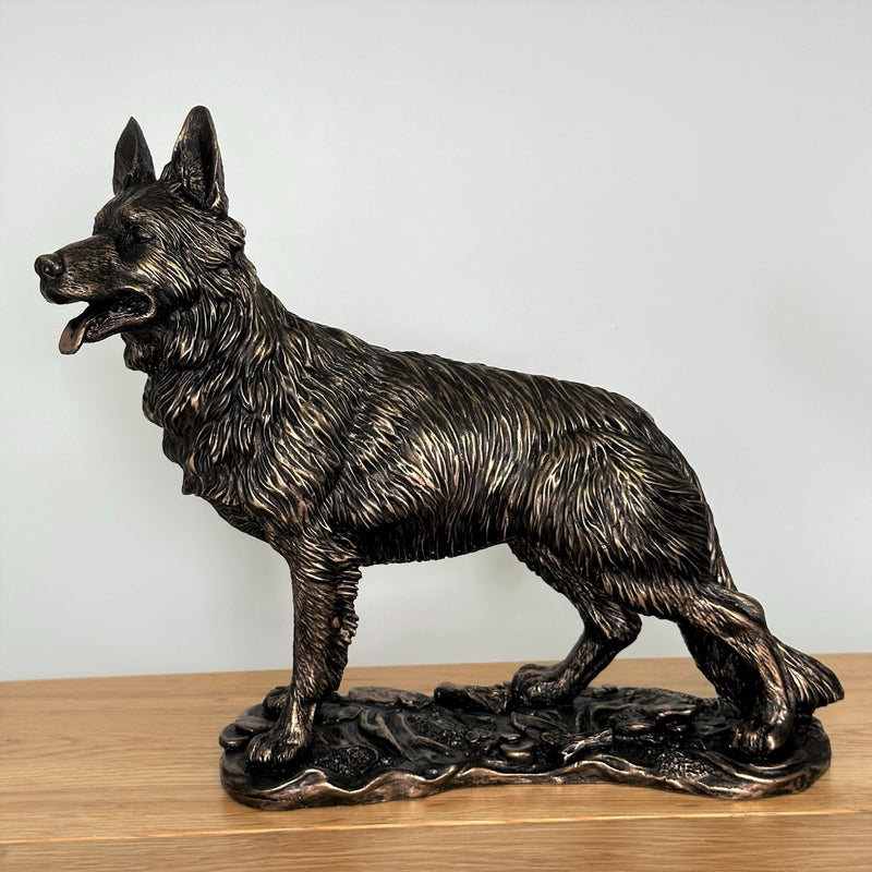 Heavy weight dark bronze effect German Shepherd Dog figurine, 26cm long