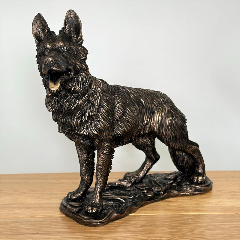 Heavy weight dark bronze effect German Shepherd Dog figurine, 26cm long