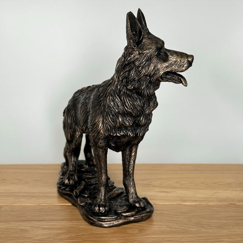 Heavy weight dark bronze effect German Shepherd Dog figurine, 26cm long