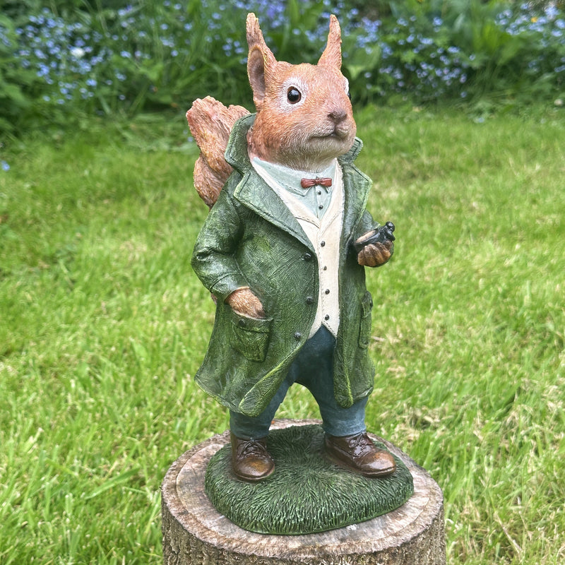 Mr Squirrel figurine ornament dressed in suit and holding stop watch garden decoration