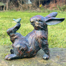 Playful Rabbit with a Bird on his Foot bronze effect figurine quirky garden or patio decoration