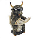 Loo Time Highland Cow on Toilet reading a newspaper figurine