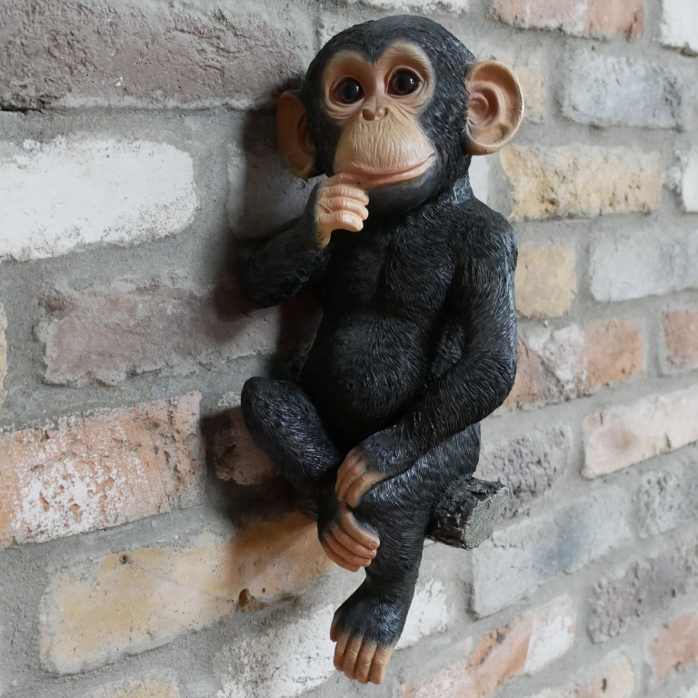 Chimpanzee sitting on a branch, novelty garden ornament decoration, Monkey lover gift