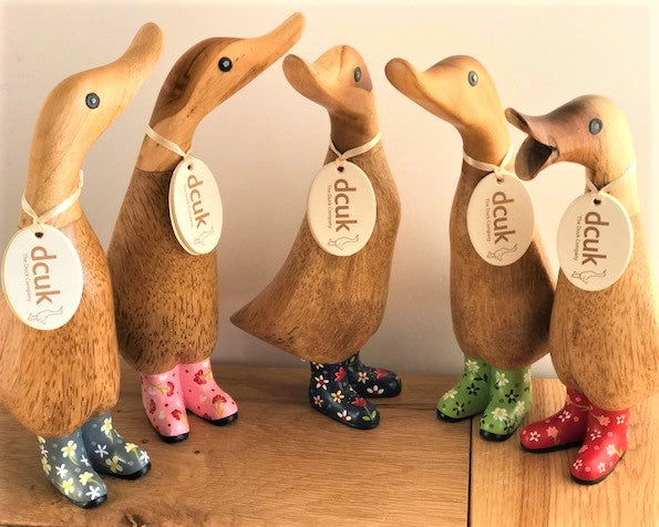 DCUK natural wood Duckling wearing Flower design Wellies in a choice of colours