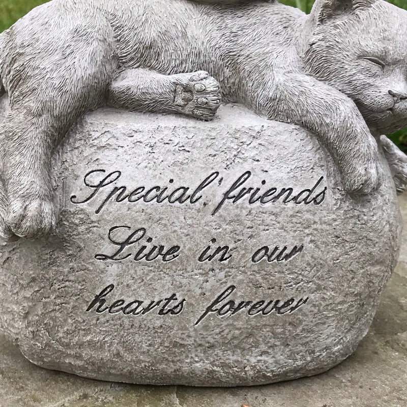 Large Cat with angel wings laying on a stone, lovely memorial, grave marker or pet loss gift