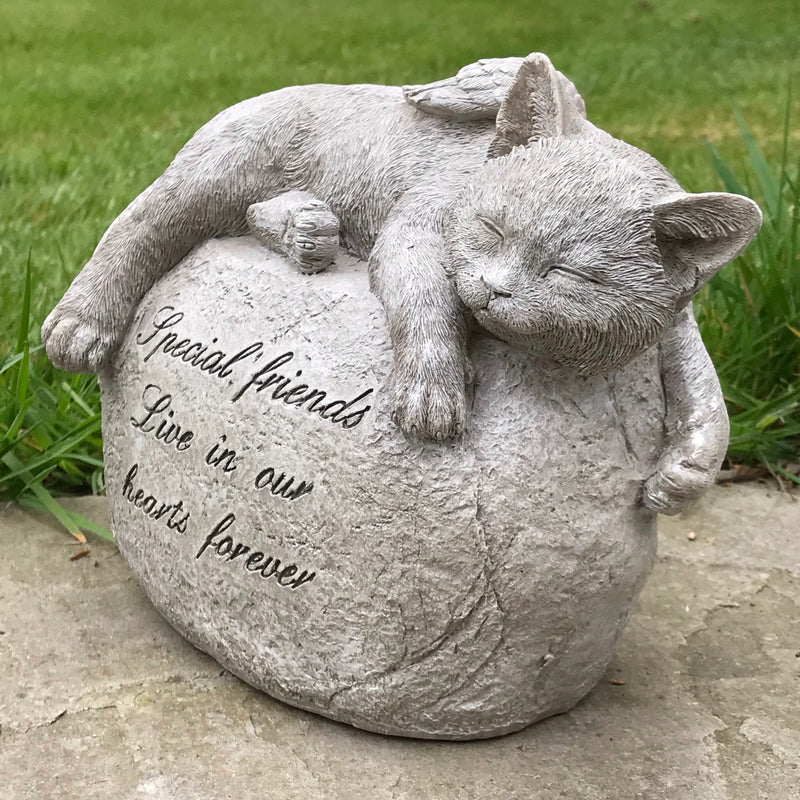 Large Cat with angel wings laying on a stone, lovely memorial, grave marker or pet loss gift