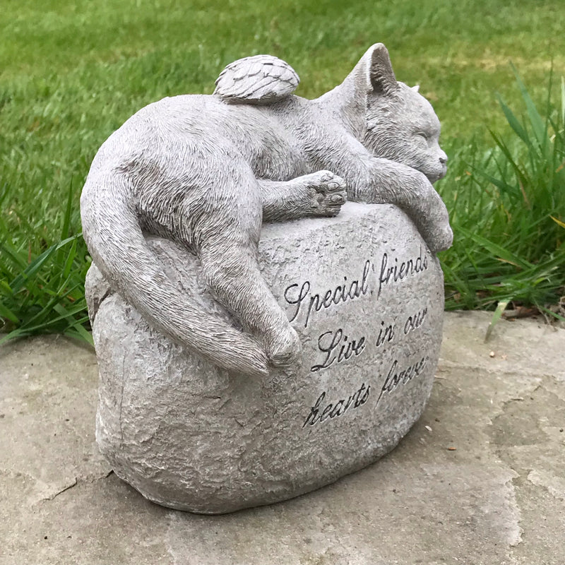 Large Cat with angel wings laying on a stone, lovely memorial, grave marker or pet loss gift